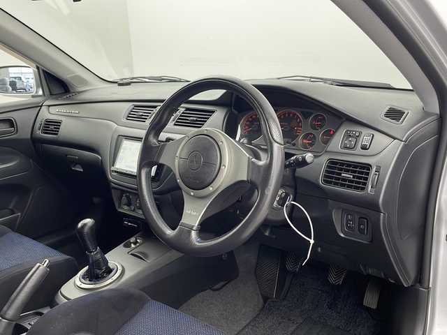 三菱 ランサー GSR エボリューションⅦ 栃木県 2001(平13)年 7.1万km サテライトシルバー 社外７インチナビ/（DVD/CD/AM・FM/BT)/ドライブレコーダー/電動格納ミラー/4WD/５速MT/センターデフロック/純正レカロシート/革巻きステアリング/革巻きシフトレバー/フォグライト/純正１７インチAW/オートエアコン/ドアバイザー/ターボタイマー/スペアキー２本/新車時保証書/取扱説明書