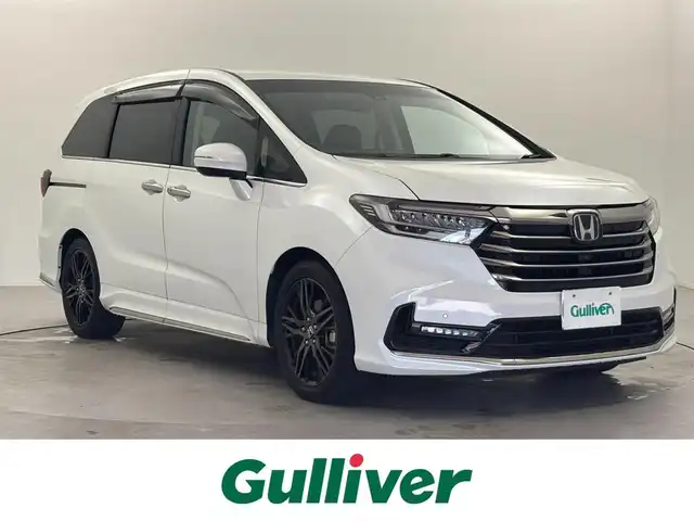 ホンダ オデッセイ ハイブリッド e:HEVアブソルート EX 福井県 2021(令3)年 2万km プラチナホワイトパール ワンオーナー/ホンダセンシング/純正10型ディーラーOPナビ/（CD/DVD/Bluetooth/フルセグTV/AppleCarPlay/HDMI)/純正ビルトイン2.0ETC/純正LEDオートライト/純正LEDフォグ/純正18インチアルミ/純正フロアマット/前後ドライブレコーダー/ハンズフリー両側電動スライドドア/ハンズフリーパワーテールゲート/マルチビューカメラ/スマートパーキングアシスト/アダプティブクルーズコントロール/レーンディパーチャーアラート/ブラインドスポットモニター/クリアランスソナー/電子パーキング/ブレーキホールド/ハーフレザーシート/前席パワーシート/シートヒーター
