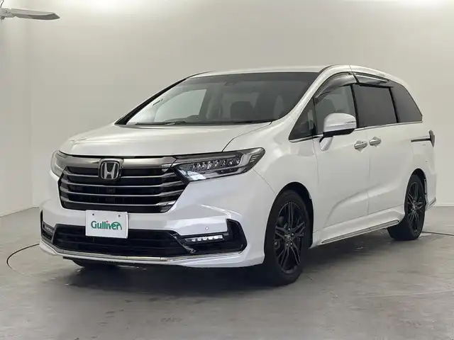 ホンダ オデッセイ ハイブリッド e:HEVアブソルート EX 福井県 2021(令3)年 2万km プラチナホワイトパール ワンオーナー/ホンダセンシング/純正10型ディーラーOPナビ/（CD/DVD/Bluetooth/フルセグTV/AppleCarPlay/HDMI)/純正ビルトイン2.0ETC/純正LEDオートライト/純正LEDフォグ/純正18インチアルミ/純正フロアマット/前後ドライブレコーダー/ハンズフリー両側電動スライドドア/ハンズフリーパワーテールゲート/マルチビューカメラ/スマートパーキングアシスト/アダプティブクルーズコントロール/レーンディパーチャーアラート/ブラインドスポットモニター/クリアランスソナー/電子パーキング/ブレーキホールド/ハーフレザーシート/前席パワーシート/シートヒーター