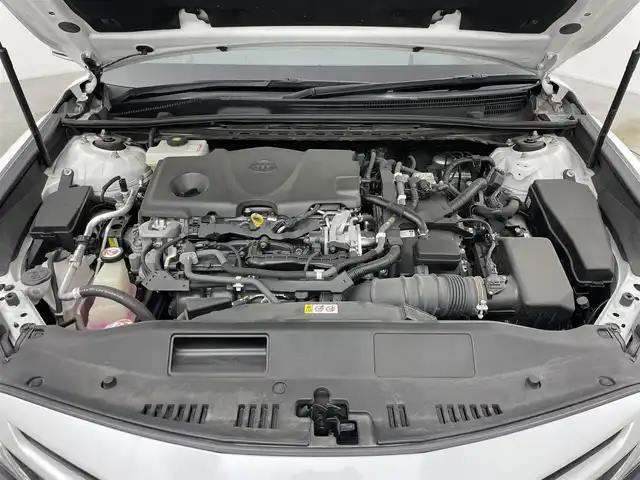 トヨタ カムリ WSレザーパッケージ 岡山県 2019(令1)年 6.1万km プラチナホワイトパールマイカ TOM’Sエアロ（前・横・後下）/レザーシート/ブラインドスポットモニター/純正8インチナビ/　「CD/DVD/フルセグTV/BT/USB」/純正ダブルツィーター/バックカメラ/追従型クルーズコントロール/オートハイビーム/LEDヘッドライト（AUTO機能付き）/ビルトインETC/前席シートヒータ/前席パワーシート/衝突軽減ブレーキシステム/車線逸脱防止システム/横滑り防止装置/純正ドライブレコーダー（前）/純正18インチアルミホイール/純正フロアマット/ステアリングヒーター/スマートキー/プッシュスタート/ヘッドアップディスプレイ/パドルシフト/バイザー