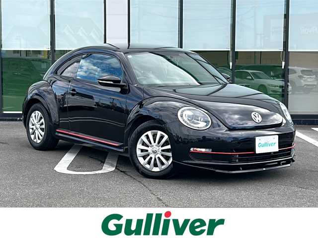 フォルクスワーゲン ザ・ビートル デザイン 岐阜県 2015(平27)年 14.4万km 黒 登録時走行距離143883km/純正ナビ/バックカメラ/フルセグTV/ターボ/Blue tooth/ETC/LEDヘッドライト/社外フロアマット/スマートキー/プッシュスタート/スペアキー/純正ホイールキャップ/エアバッグ/ABS