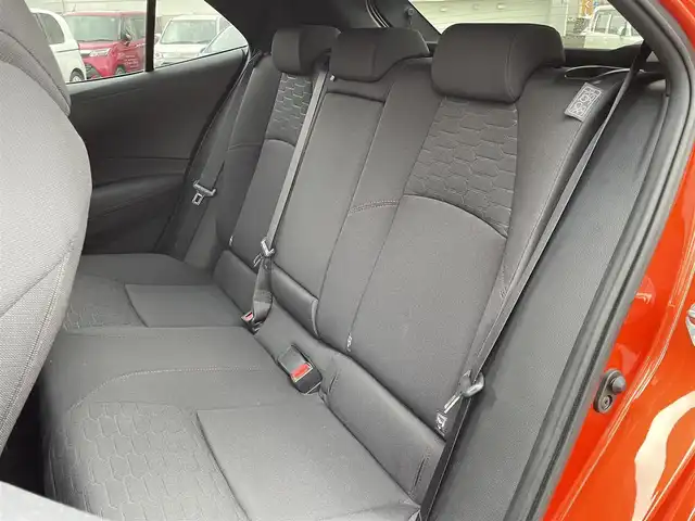トヨタ カローラ スポーツ ハイブリッドG Z 静岡県 2023(令5)年 6.5万km オレンジ ワンオーナー/純正メーカーナビ・フルセグTV/純正18インチアルミホイール/バックカメラ/TRDエアロ（サイド・リアアンダー）/TOYOTA Safety Sense /・レーダークルーズ コントロール/・プリクラッシュセーフティ/・レーンディパーチャーアラート/・発進遅れ告知機能/・オートマチックハイビーム/・レーントレーシングアシスト/・ドライバー異常時対応アシスト/・プロアクティブドライビングアシスト/シートヒーター/ビルトインETC2.0/LEDライト/スマートキー2個/プッシュスタート/新車時保証書/取扱説明書