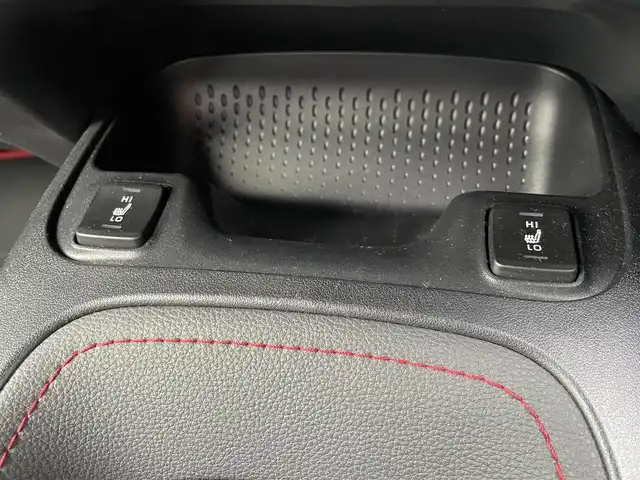 トヨタ カローラ スポーツ ハイブリッドG Z 静岡県 2023(令5)年 6.5万km オレンジ ワンオーナー/純正メーカーナビ・フルセグTV/純正18インチアルミホイール/バックカメラ/TRDエアロ（サイド・リアアンダー）/TOYOTA Safety Sense /・レーダークルーズ コントロール/・プリクラッシュセーフティ/・レーンディパーチャーアラート/・発進遅れ告知機能/・オートマチックハイビーム/・レーントレーシングアシスト/・ドライバー異常時対応アシスト/・プロアクティブドライビングアシスト/シートヒーター/ビルトインETC2.0/LEDライト/スマートキー2個/プッシュスタート/新車時保証書/取扱説明書