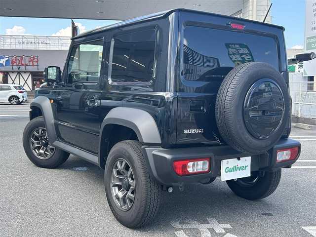 スズキ ジムニー シエラ JC 奈良県 2025(令7)年 0.8万km ブルーイッシュブラックパール3 ユーザー買取車/4WD/社外メーカー/BT/SD/アップルカープレイ対応/背面タイヤ/フルフラットシート/衝突軽減システム/横滑り防止装置/コーナーセンサー(リアのみ)/オートLEDライト/ドラレコ/ETC2.0/純正フロアマット/保証書・取説有