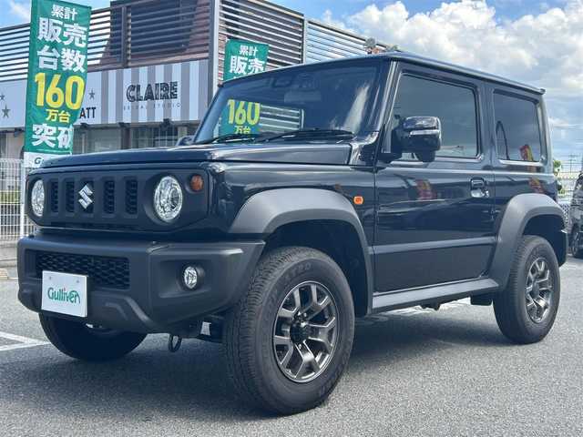 スズキ ジムニー シエラ JC 奈良県 2025(令7)年 0.8万km ブルーイッシュブラックパール3 ユーザー買取車/4WD/社外メーカー/BT/SD/アップルカープレイ対応/背面タイヤ/フルフラットシート/衝突軽減システム/横滑り防止装置/コーナーセンサー(リアのみ)/オートLEDライト/ドラレコ/ETC2.0/純正フロアマット/保証書・取説有