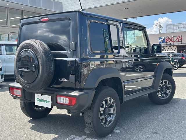 スズキ ジムニー シエラ JC 奈良県 2025(令7)年 0.8万km ブルーイッシュブラックパール3 ユーザー買取車/4WD/社外メーカー/BT/SD/アップルカープレイ対応/背面タイヤ/フルフラットシート/衝突軽減システム/横滑り防止装置/コーナーセンサー(リアのみ)/オートLEDライト/ドラレコ/ETC2.0/純正フロアマット/保証書・取説有