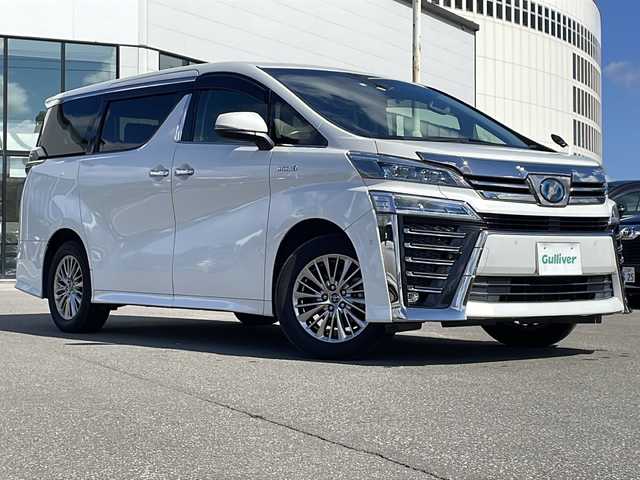 トヨタ ヴェルファイア ハイブリット ZR Gエディション 青森県 2018(平30)年 8.3万km ホワイトパールクリスタルシャイン ・本革シート/・純正12.1インチナビ/・純正フリップダウンモニター/・バックカメラ/・Bluetooth/・フルセグ/・USBポート/・衝突軽減ブレーキ/・レーンキープアシスト/・レーダークルーズコントロール/・シートヒーター/・エアシート/・パワーシート/・ハンドルヒーター/・両側パワースライドドア/・コーナーセンサー/・プッシュスタート/・スマートキー/・純正17AW/・純正LEDヘッドライト/・オートマチックハイビーム/・保証書・取説あり