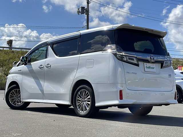 トヨタ ヴェルファイア ハイブリット ZR Gエディション 青森県 2018(平30)年 8.3万km ホワイトパールクリスタルシャイン ・本革シート/・純正12.1インチナビ/・純正フリップダウンモニター/・バックカメラ/・Bluetooth/・フルセグ/・USBポート/・衝突軽減ブレーキ/・レーンキープアシスト/・レーダークルーズコントロール/・シートヒーター/・エアシート/・パワーシート/・ハンドルヒーター/・両側パワースライドドア/・コーナーセンサー/・プッシュスタート/・スマートキー/・純正17AW/・純正LEDヘッドライト/・オートマチックハイビーム/・保証書・取説あり