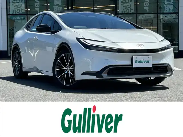 トヨタ プリウス Z 岡山県 2024(令6)年 1.4万km プラチナホワイトパールマイカ 登録時走行距離13512km/純正12.3インチナビ/フルセグTV(AM.FM.TV.BT)/全方位カメラ/ETC2.0/ブラインドスポットモニター/シートヒーター/エアシート/クリアランスソナー/衝突軽減ブレーキ/レーダークルーズコントロール/レーンキープアシスト/オートマチックハイビーム/アイドリングストップ/パワーバックドア/19インチ純正AW