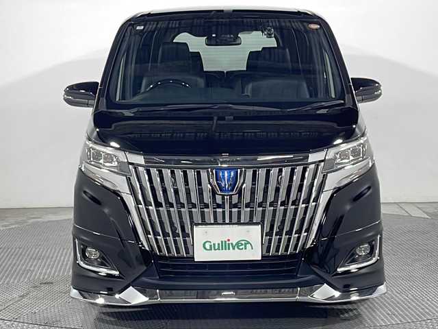 トヨタ エスクァイア ハイブリッド Gi 広島県 2020(令2)年 9万km ブラック 純正10型ナビ/純正フリップダウンモニター/モデリスタフロントエアロ/両側パワースライドドア/シートヒーター/黒革シート/バックカメラ/セーフティセンス/・プリクラッシュセーフティ/・レーンディパーチャーアラート/・オートマチックハイビーム/クルーズコントロール/クリアランスソナー/LEDヘッドランプ/オートライト/純正15インチAW/ETC/ドライブレコーダー