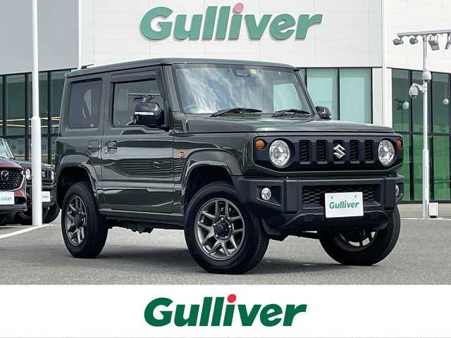 スズキ ジムニー XC 佐賀県 2023(令5)年 3.9万km ジャングルグリーン パートタイム4WD/社外メモリーナビゲーション/・フルセグTV/CD/DVD/SD/Bluetooth/バックカメラ/前方ドライブレコーダー/ETC/ミラーヒーター/DN席シートヒーター/ISOFIX対応/革巻きステアリング/ステアリングリモコン/純正16インチアルミホイール/純正LEDヘッドライト/・オートマチックハイビーム/純正フォグランプ/純正フロアマット/純正ドアバイザ―/新車保証書/スペアキー１本/クルーズコントロール/デュアルセンサーブレーキサポート/車線逸脱警報機能