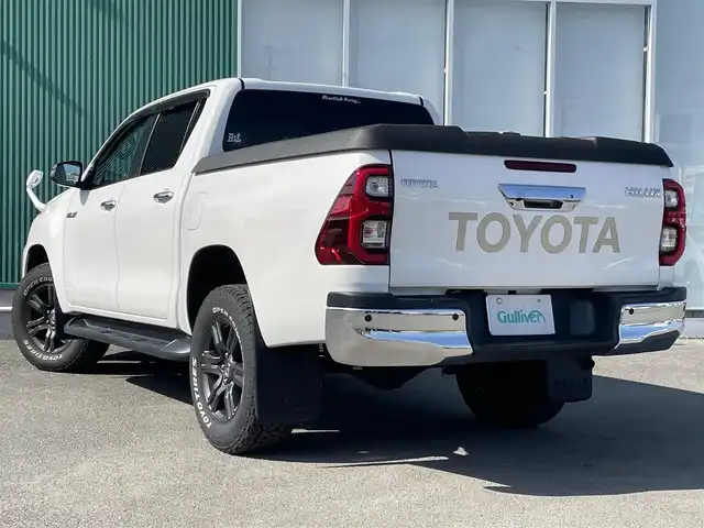 トヨタ ハイラックス Z 福岡県 2021(令3)年 6.7万km スーパーホワイトⅡ 盗難防止装置/横滑り防止装置/パーキングアシスト/レーンキープアシスト/バックカメラ/前後ドラレコ/ACC/社外８インチナビ/フルセグTV/Bluetooth/USB/ipod/2/0ETC/純正フロアマット/純正AW/4WD/MTモード付AT/寒冷地仕様/前後コーナーセンサー/センターデフロック/ダウンヒルアシストコントロール/LEDライト/デフロスターボタン/１２Vソケット2個/走行モード切替