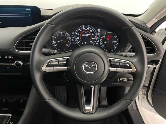 マツダ マツダ３セダン 15S ツーリング 愛知県 2020(令2)年 1.7万km スノーフレイクホワイトパールマイカ 純正10.25型ナビ SDカードなし/レーダークルーズコントロール/バックカメラ/ヘッドアップディスプレイ/コーナーセンサー/純正アルミホイール/ブラインドスポットモニター/LEDヘッドライト/オートマチックハイビーム/ドライブレコーダー/ETC/衝突軽減システム/フルセグ/CD DVD/Bluetooth/ステアリングスイッチ/スマートキー/プッシュスタート
