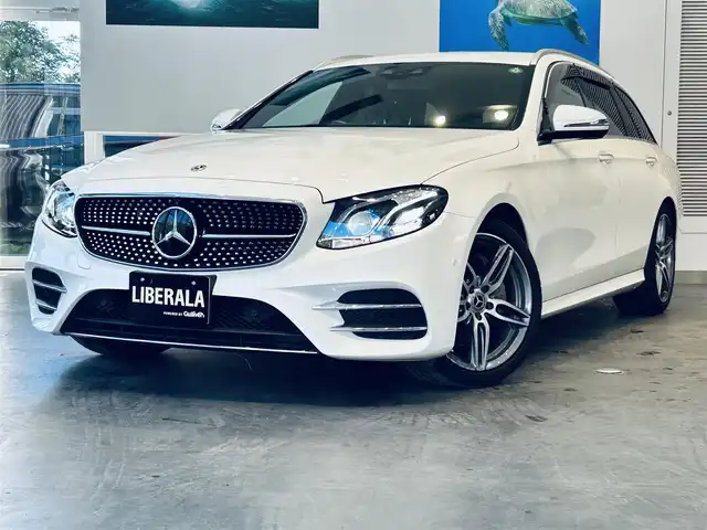 メルセデス・ベンツ Ｅ２２０ｄ SW アバンギャルド スポーツ 大阪府 2017(平29)年 5万km ダイヤモンドホワイト ワンオーナー/レーダーセーフティP/純正ナビ/TV/360度カメラ/applecarplay/ACC/純正19インチAW/LEDヘッドライト/アンビエントライト/電動リアゲート/ブラインドスポット/ハーフレザー/メモリ付きパワーシート/シートヒーター/ルーフレール
