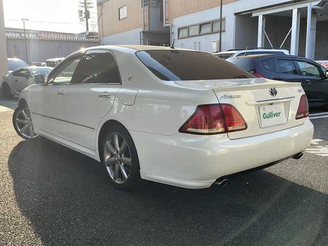 トヨタ クラウン アスリート 60th スペシャルエディション 大阪府 2006(平18)年 10.1万km ホワイトパールクリスタルシャイン 純正ナビ/HDDナビ/AM/FM/HDD/CD/MD/バックカメラ/クルーズコントロール/プッシュスタート/前席独立エアコン/ドアバイザー/レザー調シートカバー/ETC/HID/フォグランプ/保証書