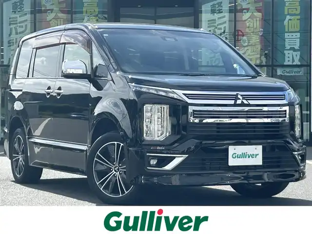 三菱 デリカＤ：５ アーバンギア G 岡山県 2019(平31)年 4.1万km ダイヤモンドブラックマイカ 登録時走行距離40168km/純正10.1インチナビ/フリップダウンモニター/フルセグTV(AM.FM.CD.DVD.TV.BT)/両側パワースライドドア/全方位カメラ/ETC/e-Assist/クリアランスソナー/衝突軽減ブレーキ/横滑り防止装置/クルーズコントロール(追従走行あり)/車線逸脱警報（レーンキープアシスト）/オートライト/オートマチックハイビーム/アイドリングストップ/18インチ純正AW/純正フロアマット/スマートキー