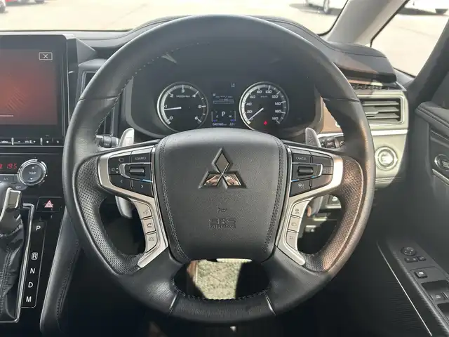 三菱 デリカＤ：５ アーバンギア G 岡山県 2019(平31)年 4.1万km ダイヤモンドブラックマイカ 登録時走行距離40168km/純正10.1インチナビ/フリップダウンモニター/フルセグTV(AM.FM.CD.DVD.TV.BT)/両側パワースライドドア/全方位カメラ/ETC/e-Assist/クリアランスソナー/衝突軽減ブレーキ/横滑り防止装置/クルーズコントロール(追従走行あり)/車線逸脱警報（レーンキープアシスト）/オートライト/オートマチックハイビーム/アイドリングストップ/18インチ純正AW/純正フロアマット/スマートキー