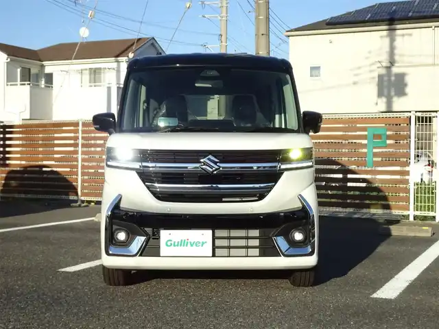 スズキ スペーシア カスタム HYBRID XS ターボ 千葉県 2025(令7)年 0.1千km ピュアホワイトパール/ブラック2トーン 【届出済未使用車】/【ピュアホワイトP/ブラック2トーン（C2H）】/LEDヘッドライト/LEDフォグランプ/パドルシフト/パワーモード/ヘッドアップディスプレイ/スズキセーティサポート/両側パワースライドドア/ハーフレザーシート/シートヒーター/純正15インチAW/アダプティブクルーズコントロール/プッシュスタート/スマートキー2本/プレミアムUV/IRカットガラス/サイド/カーテンエアバッグ/保証書/取扱説明書/