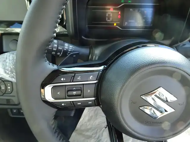 スズキ スペーシア カスタム HYBRID XS ターボ 千葉県 2025(令7)年 0.1千km ピュアホワイトパール/ブラック2トーン 【届出済未使用車】/【ピュアホワイトP/ブラック2トーン（C2H）】/LEDヘッドライト/LEDフォグランプ/パドルシフト/パワーモード/ヘッドアップディスプレイ/スズキセーティサポート/両側パワースライドドア/ハーフレザーシート/シートヒーター/純正15インチAW/アダプティブクルーズコントロール/プッシュスタート/スマートキー2本/プレミアムUV/IRカットガラス/サイド/カーテンエアバッグ/保証書/取扱説明書/