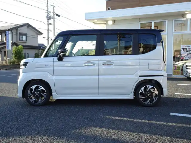 スズキ スペーシア カスタム HYBRID XS ターボ 千葉県 2025(令7)年 0.1千km ピュアホワイトパール/ブラック2トーン 【届出済未使用車】/【ピュアホワイトP/ブラック2トーン（C2H）】/LEDヘッドライト/LEDフォグランプ/パドルシフト/パワーモード/ヘッドアップディスプレイ/スズキセーティサポート/両側パワースライドドア/ハーフレザーシート/シートヒーター/純正15インチAW/アダプティブクルーズコントロール/プッシュスタート/スマートキー2本/プレミアムUV/IRカットガラス/サイド/カーテンエアバッグ/保証書/取扱説明書/