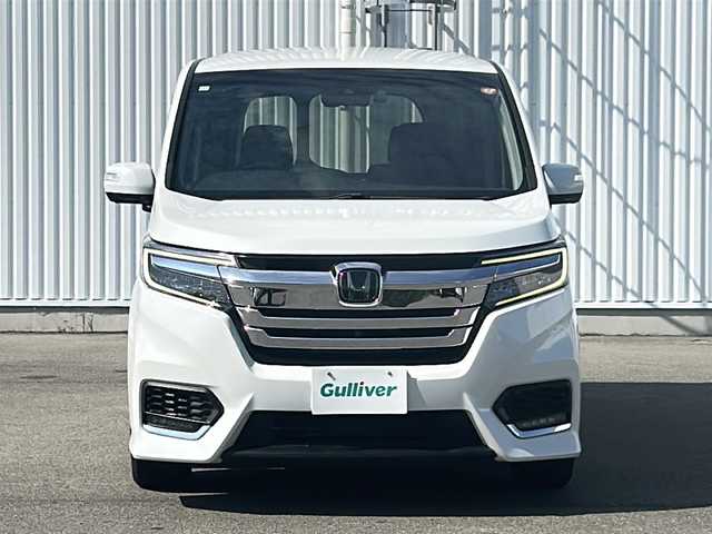 ホンダ ステップワゴン スパーダ ハイブリッド G EX ホンダセンシング 愛媛県 2019(平31)年 7.2万km プラチナホワイトパール 全方位カメラ/ホンダセンシング/フリップダウンモニター/両側パワースライドドア/純正10インチナビ/フルセグTV/ビルトインETC/ドライブレコーダー前後/オートライトLED/フォグランプ/ハーフレザー/シートヒーター/純正フロアマット/横滑り防止装置/レーンキープアシスト/ウォークスルー/クルーズコントロール/スマートキー/ABS