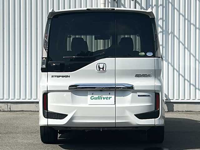 ホンダ ステップワゴン スパーダ ハイブリッド G EX ホンダセンシング 愛媛県 2019(平31)年 7.2万km プラチナホワイトパール 全方位カメラ/ホンダセンシング/フリップダウンモニター/両側パワースライドドア/純正10インチナビ/フルセグTV/ビルトインETC/ドライブレコーダー前後/オートライトLED/フォグランプ/ハーフレザー/シートヒーター/純正フロアマット/横滑り防止装置/レーンキープアシスト/ウォークスルー/クルーズコントロール/スマートキー/ABS
