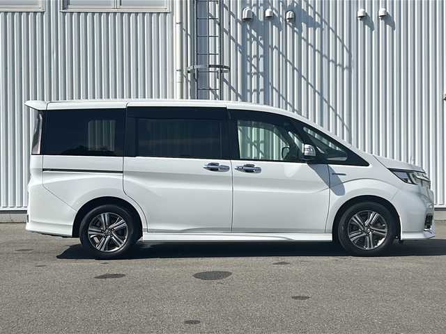 ホンダ ステップワゴン スパーダ ハイブリッド G EX ホンダセンシング 愛媛県 2019(平31)年 7.2万km プラチナホワイトパール 全方位カメラ/ホンダセンシング/フリップダウンモニター/両側パワースライドドア/純正10インチナビ/フルセグTV/ビルトインETC/ドライブレコーダー前後/オートライトLED/フォグランプ/ハーフレザー/シートヒーター/純正フロアマット/横滑り防止装置/レーンキープアシスト/ウォークスルー/クルーズコントロール/スマートキー/ABS