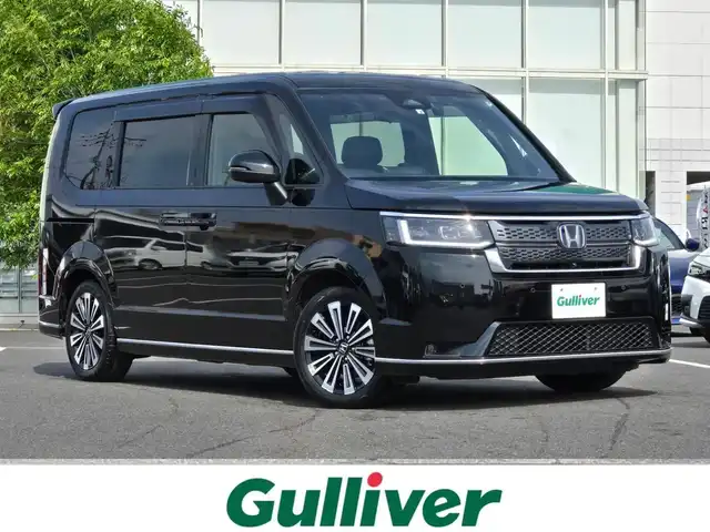 ホンダ ステップワゴン スパーダ eHEV プレミアムライン 鹿児島県 2022(令4)年 7万km クリスタルブラックパール １５．６インチフリップダウンモニター/アダプティブクルーズコントロール　/両側パワースライドドア　/ビルトインＥＴＣ　/Ｄ＋Ｎ席シートヒーター　/マルチビューカメラシステム　/前後ドライブレコーダー/純正11.4インチナビ/Bluetoothオーディオ/電動リアゲート/ホンダセンシング/MTモード付きAT/パドルシフト/純正アルミホイール(17インチ)/前後コーナーセンサー/横滑り防止装置/レーンキープアシスト/エアバッグ(W＋サイド)/カーテンエアバッグ/プッシュスタート/スマートキー