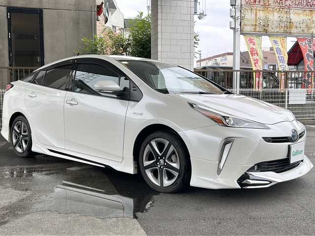 トヨタ プリウス A ツーリングセレクション 京都府 2020(令2)年 1.6万km ホワイトパールクリスタルシャイン モデリスタフルエアロ /ワンオーナー　/純正ディーラーＯＰＳＤナビ　/フルセグＴＶ　/革シート　/トヨタセーフティセンス　/バックカメラ　/前後コーナーセンサー　/LEDライト　/クルーズコントロール　/D席パワーシート/スマートキー/純正AW17インチ/前方純正ドライブレコーダー/ウィンカーミラー/アイドリングストップ/純正ビルトインETC/ワイヤレス充電/BSM/HUD