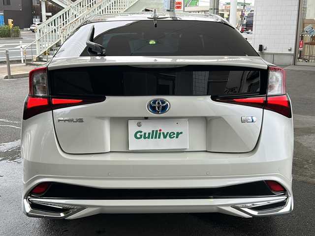 トヨタ プリウス A ツーリングセレクション 京都府 2020(令2)年 1.6万km ホワイトパールクリスタルシャイン モデリスタフルエアロ /ワンオーナー　/純正ディーラーＯＰＳＤナビ　/フルセグＴＶ　/革シート　/トヨタセーフティセンス　/バックカメラ　/前後コーナーセンサー　/LEDライト　/クルーズコントロール　/D席パワーシート/スマートキー/純正AW17インチ/前方純正ドライブレコーダー/ウィンカーミラー/アイドリングストップ/純正ビルトインETC/ワイヤレス充電/BSM/HUD
