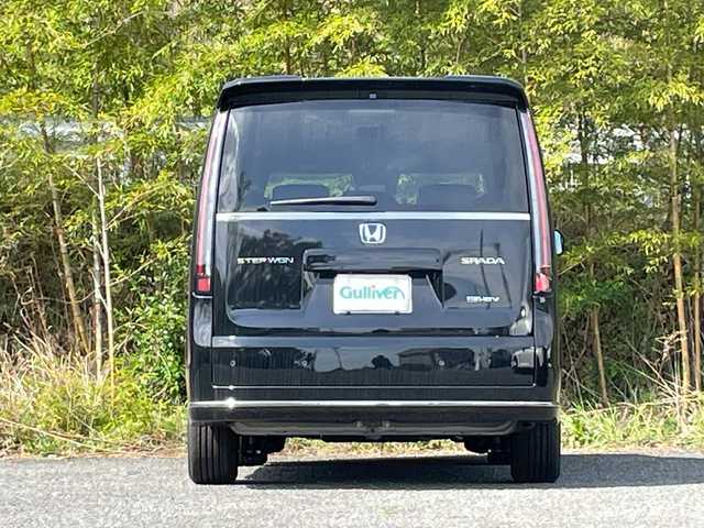 ホンダ ステップワゴン スパーダ eHEV 大分県 2024(令6)年 0.1万km未満 黒 登録済み未使用車/純正16インチアルミホイール/純正LEDヘッドライト/オートライト/電動リアゲート
