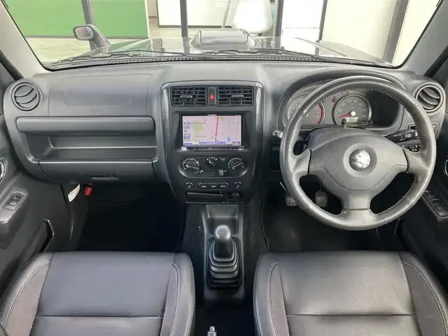 スズキ ジムニー クロスアドベンチャー XC 道南・函館 2011(平23)年 3.4万km クエーサーグレーメタリック ／社外ナビ（BT/CD/DVD)/／フルセグＴＶ/／バックカメラ/／ＥＴＣ/／運転席シートヒーター/／合皮シート/／ライトレベライザー/／トランスファーボタン/／５速マニュアル/／純正アルミホイール/／フォグランプ