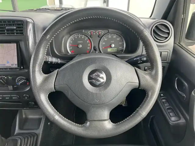 スズキ ジムニー クロスアドベンチャー XC 道南・函館 2011(平23)年 3.4万km クエーサーグレーメタリック ／社外ナビ（BT/CD/DVD)/／フルセグＴＶ/／バックカメラ/／ＥＴＣ/／運転席シートヒーター/／合皮シート/／ライトレベライザー/／トランスファーボタン/／５速マニュアル/／純正アルミホイール/／フォグランプ