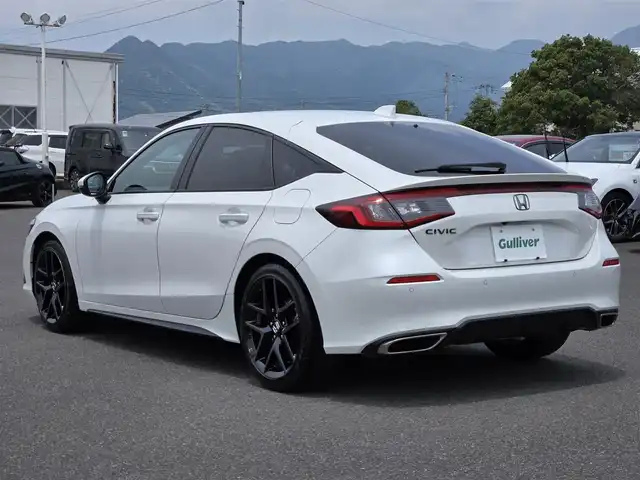ホンダ シビック EX 鹿児島県 2022(令4)年 3.8万km プラチナホワイトパール ＢＯＳＥプレミアムサウンドシステム　/アダプティブクルーズコントロール　/ＥＴＣ２．０　/ｉＱ充電　/ホンダセンシング　/Ｄ＋Ｎ席パワーシート　/Ｄ＋Ｎ席シートヒーター　/前後ドライブレコーダー　/純正ＨＤＤナビ/Bluetoothオーディオ/フロントワイドビューカメラ/トラフィックジャムアシスト/アダプティブドライビングビーム/レーンキープアシスト/横滑り防止装置/前後コーナーセンサー/エアバッグ(W＋サイド)/カーテンエアバッグ