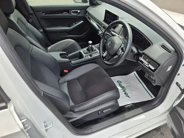 ホンダ シビック EX 鹿児島県 2022(令4)年 3.8万km プラチナホワイトパール ＢＯＳＥプレミアムサウンドシステム　/アダプティブクルーズコントロール　/ＥＴＣ２．０　/ｉＱ充電　/ホンダセンシング　/Ｄ＋Ｎ席パワーシート　/Ｄ＋Ｎ席シートヒーター　/前後ドライブレコーダー　/純正ＨＤＤナビ/Bluetoothオーディオ/フロントワイドビューカメラ/トラフィックジャムアシスト/アダプティブドライビングビーム/レーンキープアシスト/横滑り防止装置/前後コーナーセンサー/エアバッグ(W＋サイド)/カーテンエアバッグ