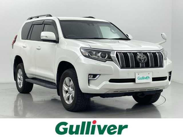 トヨタ ランドクルーザー プラド TX 熊本県 2018(平30)年 6.7万km ホワイトパールクリスタルシャイン ４WD/社外ナビAVIC-RW501（ＣＤ・ＤＶＤ・フルセグ・ＢＴ）/バックカメラ　/社外前方ドライブレコーダー　/ビルトインＥＴＣ　/前後クリアランスソナー　/トヨタセーフティーセンス/・プリクラッシュセーフティ/・レーンディパーチャーアラート/・オートマチックハイビーム/・アダブティブクルーズコントロール/横滑り防止/ダウンヒルアシスト/ルーフレール/革巻きステアリング/純正フロアマット/純正17インチAW/オートライト/LEDヘッドライト/フォグランプ/スマートキー/プッシュスタート