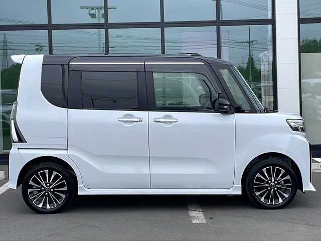 ダイハツ タント カスタム RS 道東・釧路十勝 2023(令5)年 0.8万km ブラックマイカメタリック/シャイニングホワイトパール ・４WD/・純正10インチナビ/（CD・DVD・AM・FM・SD・フルセグ）/・全方位モニター/・両側パワースライドドア/・純正アルミホイール/・コーナーセンサー前後/・衝突被害軽減ブレーキ/・レーンキープアシスト/・LEDヘッドライト/・ハーフレザーシート/・前席シートヒーター/・オートライト/・オートマチックハイビーム/・ステアリングスイッチ/・ドアバイザー/・リアサンシェード/・スマートキー/・プッシュスタート/・純正フロアマット