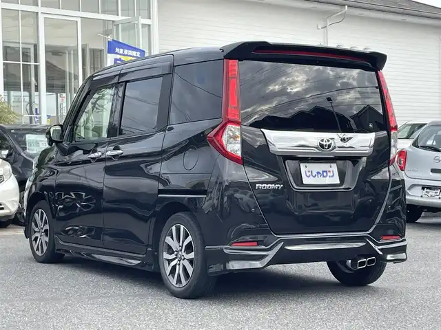 トヨタ ルーミー カスタムG－T 愛知県 2017(平29)年 10.7万km ブラックマイカメタリック (株)IDOMが運営する【じしゃロン名古屋鳴海店】の自社ローン専用車両になりますこちらは現金またはオートローンご利用時の価格です。自社ローンご希望の方は別途その旨お申付け下さい社外メモリナビ/フルセグ CD DVD BT MSV/両側パワスラ/バックカメラ/ビルトインETC/LEDヘッドライト/LEDフォグ/クルコン/PCS/クリアランスソナー/純正15インチAW/純正バイザー/社外マット/MOPスペアタイヤ/スペアキー/取説/保証書