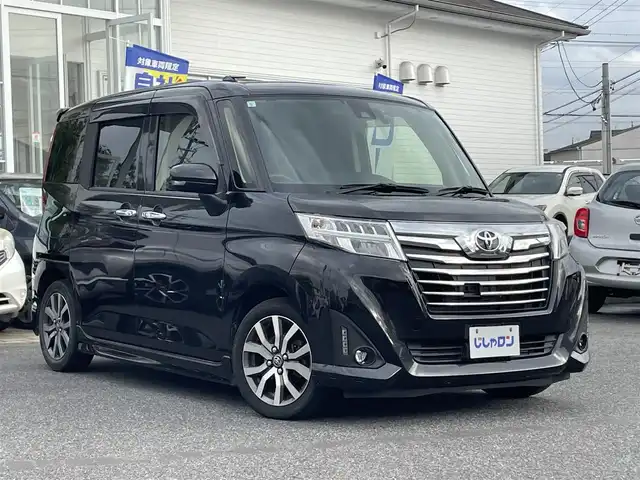 トヨタ ルーミー カスタムG－T 愛知県 2017(平29)年 10.7万km ブラックマイカメタリック (株)IDOMが運営する【じしゃロン名古屋鳴海店】の自社ローン専用車両になりますこちらは現金またはオートローンご利用時の価格です。自社ローンご希望の方は別途その旨お申付け下さい社外メモリナビ/フルセグ CD DVD BT MSV/両側パワスラ/バックカメラ/ビルトインETC/LEDヘッドライト/LEDフォグ/クルコン/PCS/クリアランスソナー/純正15インチAW/純正バイザー/社外マット/MOPスペアタイヤ/スペアキー/取説/保証書