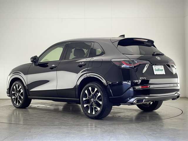 ホンダ ＺＲ－Ｖ Z 宮崎県 2023(令5)年 1万km クリスタルブラックパール BOSEサウンドシステム/Honda SENSING/〇衝突軽減ブレーキ（CMBS）/〇先行車発進お知らせ機能/〇歩行者事故低減ステアリング/〇路外逸脱抑制機能/〇標識認識機能/〇渋滞追従機能付アダプティブクルーズコントロール（ACC）/〇車線維持支援システム（LKAS）/〇トラフィックジャムアシスト（渋滞運転支援機能）/〇ブラインドスポットインフォメーション/〇誤発進抑制機能/〇後方誤発進抑制機能/〇近距離衝突軽減ブレーキ/〇パーキングセンサーシステム/〇後退出庫サポート/〇オートハイビーム/〇アダプティブドライビングビーム/純正9インチナビ/フルセグTV/全方位モニター/黒レザーシート/パワーシート/シートヒーター/ステアリングヒーター/パドルシフト/ハンズフリーアクセスパワーテールゲート(予約クローズ機能付)/ワイヤレス充電/LEDヘッドライト/前後ドライブレコーダー/純正18インチAW/ビルトインETC2.0/スマートキー×２/保証書/取扱説明書
