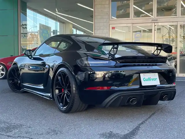 ポルシェ ７１８ケイマン GT4 東京都 2021(令3)年 0.8万km 黒 ６速MT/ワンオーナー/純正ナビ/・BT/CD/DVD/SD/BT/ラジオ/リアビューカメラ/ビルトインETC2.0/LEDヘッドライト/オートエアコン/クロノパッケージ/シートヒーター/電動AOUT格納機能付ミラー/新車時保証書/取扱説明書