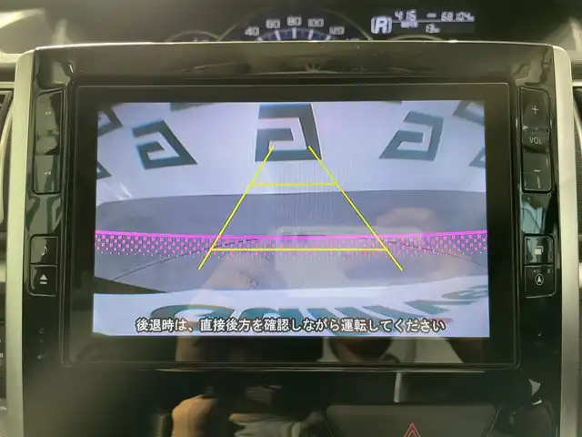 ダイハツ タント カスタム RS SA 鹿児島県 2015(平27)年 6.9万km プラムブラウンクリスタルマイカ ワンオーナー　/禁煙車　/純正８インチナビ（CD/DVD/Bluetooth/フルセグTV）/スマートアシスト　/バックカメラ　/両側パワースライドドア　/ＬＥＤヘッドライト　/横滑り防止機能　　/後席ロール式サンシェード　/ＥＴＣ　/オートライト/純正フロアマット/フォグランプ/純正アルミホイール