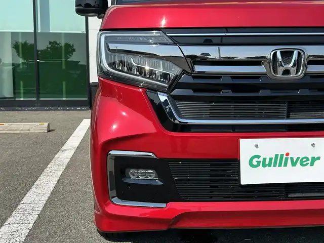 ホンダ Ｎ ＢＯＸ カスタム L 和歌山県 2022(令4)年 7.1万km プレミアムクリスタルレッドM 後期型モデル/電子式パーキング/ステアリングスイッチ/レーダークルーズコントロール/ホンダセンシング/両側パワースライドドア/LEDヘッドライト/純正デイスプレーオーディオ/バックカメラ/革シート/シートヒーター