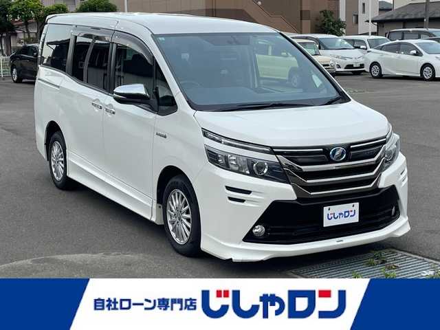 トヨタ ヴォクシー ハイブリッド V 宮城県 2015(平27)年 12.3万km ホワイトパールクリスタルシャイン (株)IDOMが運営する【じしゃロン仙台店】の自社ローン専用車両になりますこちらは現金またはオートローンご利用時の価格です。自社ローンご希望の方は別途その旨お申付け下さい/両側パワースライドドア/SDナビ/フリップダウンモニター/フルセグ/Bluetooth/Blu-ray/CD/DVD/バックカメラ/ドラレコ/ビルトインETC/Qi充電/シートヒーター/クルコン