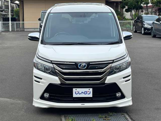トヨタ ヴォクシー ハイブリッド V 宮城県 2015(平27)年 12.3万km ホワイトパールクリスタルシャイン (株)IDOMが運営する【じしゃロン仙台店】の自社ローン専用車両になりますこちらは現金またはオートローンご利用時の価格です。自社ローンご希望の方は別途その旨お申付け下さい/両側パワースライドドア/SDナビ/フリップダウンモニター/フルセグ/Bluetooth/Blu-ray/CD/DVD/バックカメラ/ドラレコ/ビルトインETC/Qi充電/シートヒーター/クルコン
