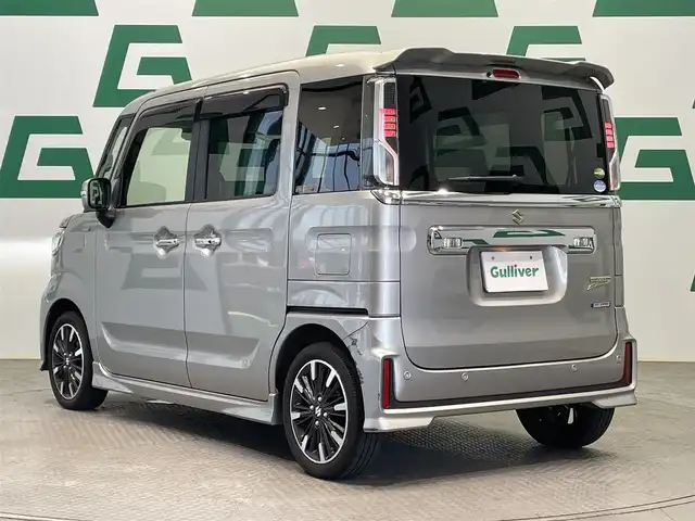 スズキ スペーシア カスタム HYBRID XS 鹿児島県 2020(令2)年 1.8万km スチールシルバーM ディスプレイオーディオ　/スズキセーフティサポート　/デュアルカメラブレーキサポート　/革巻きステアリング　/ステアリングリモコン　/フロントフォグライト　/ロールサンシェード　/後席パーソナルテーブル　/ドアバイザー/禁煙