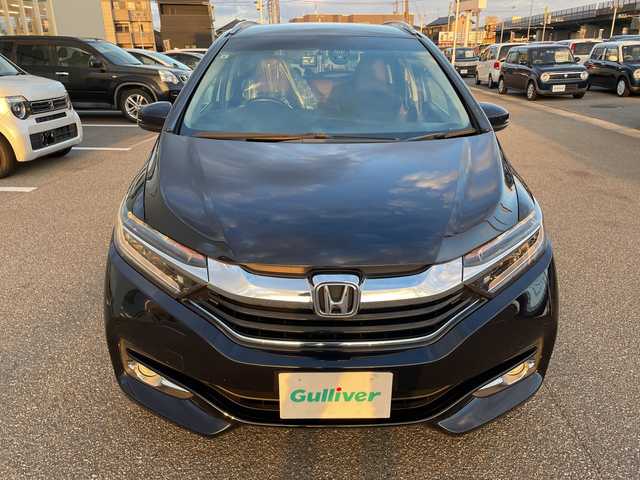 ホンダ シャトル ハイブリッド Z 石川県 2017(平29)年 8万km ミッドナイトブルービームM 社外メモリーナビ　フルセグＴＶ　バックカメラ　ＬＥＤヘッドライト　ＥＴＣ　ハーフレザーシート　シートヒーター　スマートキー　プッシュスタート　電動ミラー　フロアマット