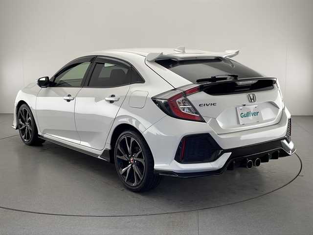 ホンダ シビック ハッチバック 宮崎県 2019(令1)年 1.3万km ホワイトオーキッドパール 禁煙車/ホンダセンシング/純正ナビTV/（VXM-204VFi/CD/DVD/Bluetooth/フルセグTV)/純正バックカメラ/純正ビルトインETC/純正ドライブレコーダー/純正18インチアルミ/純正エアロ/純正ルーフエンドスポイラー/純正フロアマット/アダプティブクルーズコントロール/レーンディパーチャーアラート/クリアランスソナー/電子パーキング/ブレーキホールド/前席シートヒーター/オートエアコン/本革巻ハンドル/パドルシフト/スマートキー/プッシュエンジンスタート
