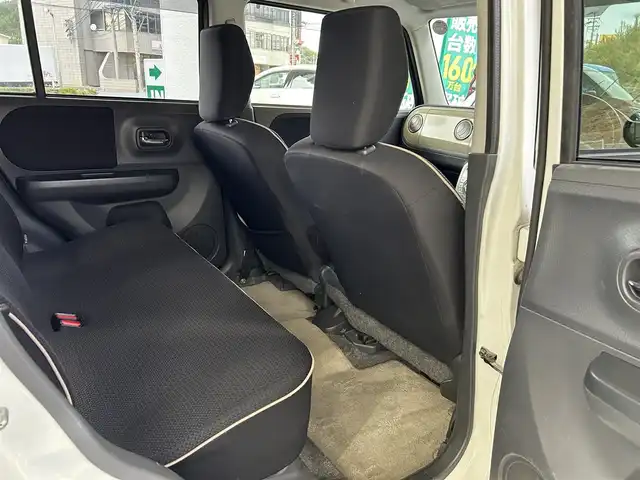 スズキ ラパン X セレクション 福島県 2013(平25)年 10.8万km パールホワイト 登録時走行距離：107992km/ワンオーナー/純正オーディオ/ (CD/AM/FM)/プッシュスタート/シートヒーター/ (D席)/革巻きステアリング/ISOFIX/純正フロアマット/純正14インチAW/ハロゲンヘッドライト/ドアバイザー/電動格納ミラー/ウィンカーミラー/アイドリングストップ/スマートキー/スペアキー×１/保証書/取扱説明書