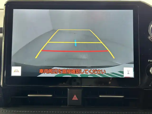 トヨタ ヴォクシー ハイブリッド S－Z 佐賀県 2022(令4)年 6.9万km アティチュードブラックマイカ 純正10.5インチディスプレイオーディオ/コネクティッドナビ対応/ディーラーオプションDVDキット/フルセグＴＶ/Bluetooth/CD/DVD/carplay/純正14インチフリップダウンモニター/シグネチャーイルミグリル/バックカメラ/衝突被害軽減システム/レーダークルーズコントロール/レーンアシスト/ブラインドスポットモニター/パーキングサポートブレーキ/ダウンヒルアシストコントロール/ロードサインアシスト/オートライト/オートマチックハイビーム/LEDヘッドライト/ＬＥＤフォグライト/クリアランスソアー/電動パーキング/ブレーキホールド/両側パワースライドドア/運転席・助手席シートヒーター/後席サンシェード/ハーフレザーシート/純正フロアマット/純正17インチアルミホイール/スマートキー/スペアキー×１